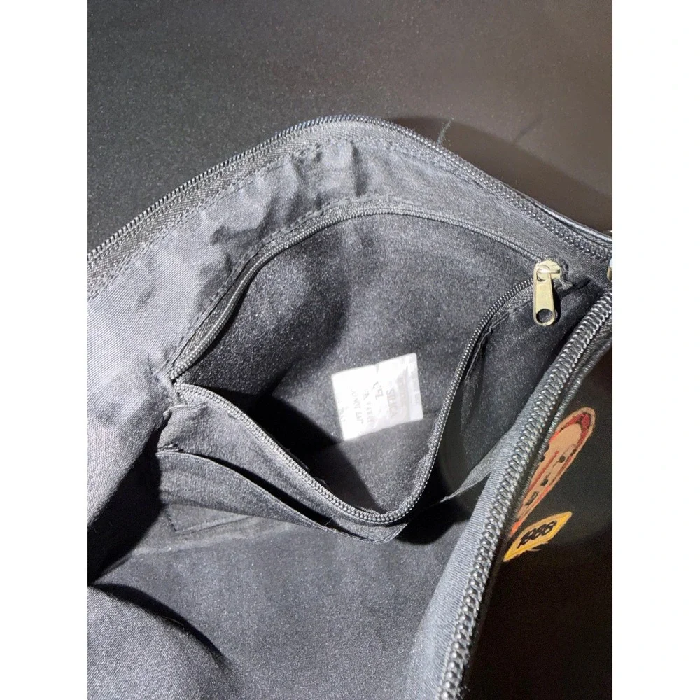 Black Faux Leather Patch Clutch Bag with Tassel Zipper Pull and Interior Pockets